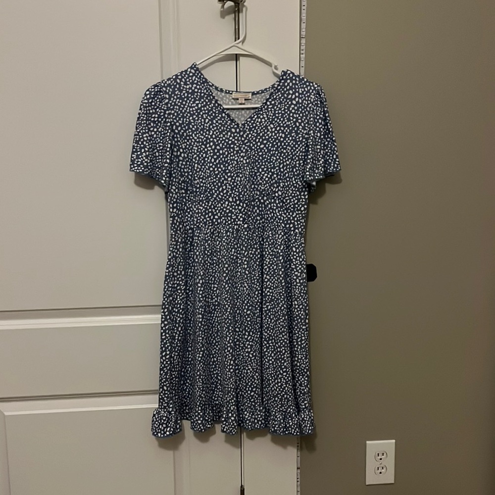 Light blue dress with white polkadots all over. Size 16 in kids